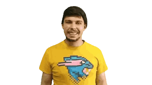 A Man Wearing A Yellow Shirt With A Pixelated Shark On It Sticker
