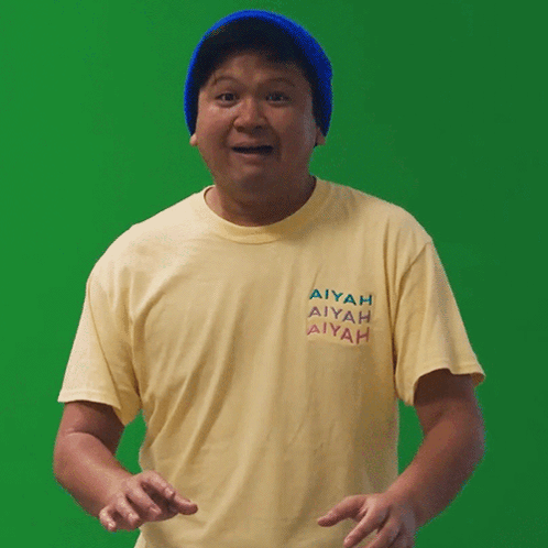 A Man Wearing A Yellow T-Shirt That Says Aiyah GIF