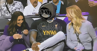 A Man Wearing A Ynwa Jersey Sits In A Crowd GIF
