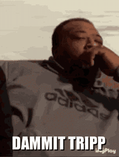 A Man Wearing An Adidas Shirt Is Smoking A Cigarette And Says Dammit Tripp . GIF