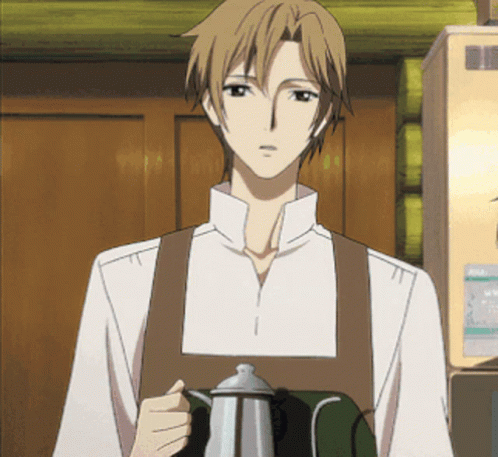 A Man Wearing An Apron Is Holding A Coffee Pot GIF