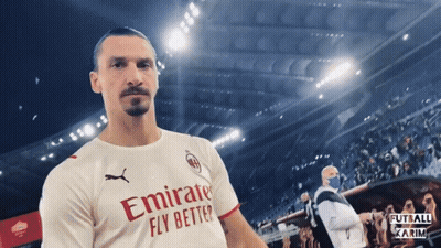 A Man Wearing An Emirates Fly Better Jersey GIF