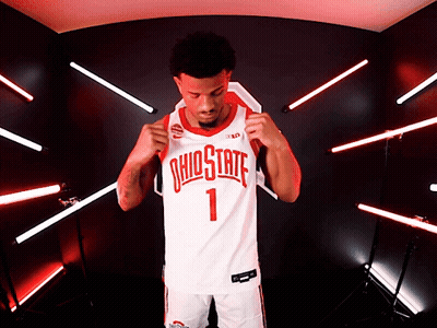 A Man Wearing An Ohio State Jersey With The Number 1 GIF