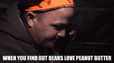 A Man Wearing An Orange Hat With The Words When You Find Out Bears Love Peanut Butter GIF