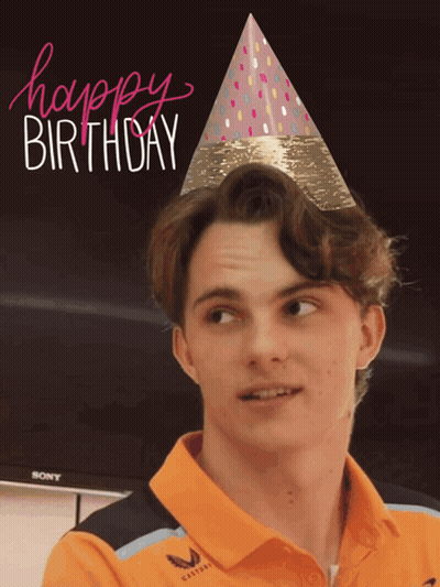 A Man Wearing An Orange Shirt And A Party Hat With The Words Happy Birthday On It GIF