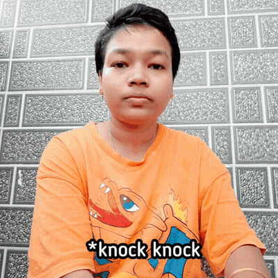 A Man Wearing An Orange Shirt That Says * Knock Knock * GIF