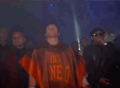 A Man Wearing Boxing Gloves And A Jersey That Says Anell GIF