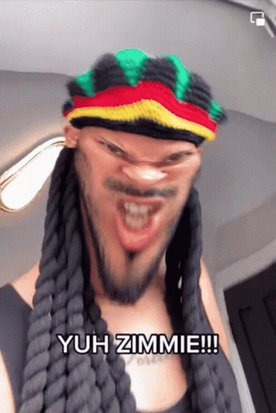 A Man Wearing Dreadlocks And A Rasta Hat Says Yuh Zimmie !!! GIF