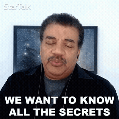 A Man Wearing Ear Buds Says We Want To Know All The Secrets GIF
