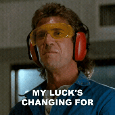 A Man Wearing Ear Muffs And Goggles Has The Words My Luck 'S Changing For Above Him GIF