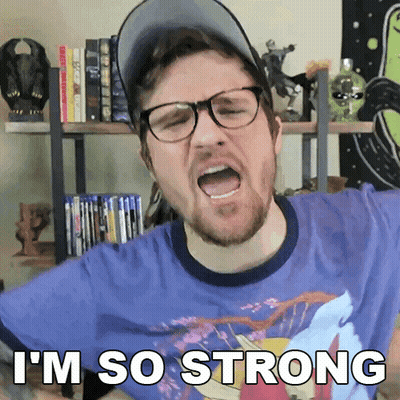 A Man Wearing Glasses And A Baseball Cap Says I 'M So Strong GIF