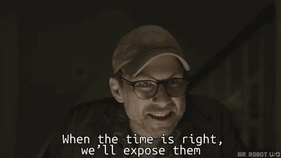 A Man Wearing Glasses And A Baseball Cap Says When The Time Is Right We 'Ll Expose Them GIF