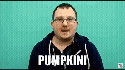 A Man Wearing Glasses And A Black Hoodie Is Talking About Pumpkin . GIF