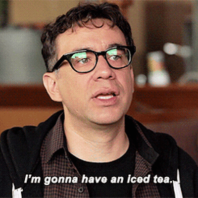 A Man Wearing Glasses And A Black Hoodie Says " I 'M Gonna Have An Iced Tea " GIF
