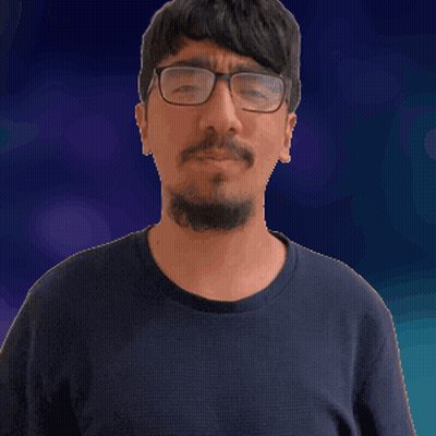 A Man Wearing Glasses And A Black Shirt Is Making A Funny Face GIF