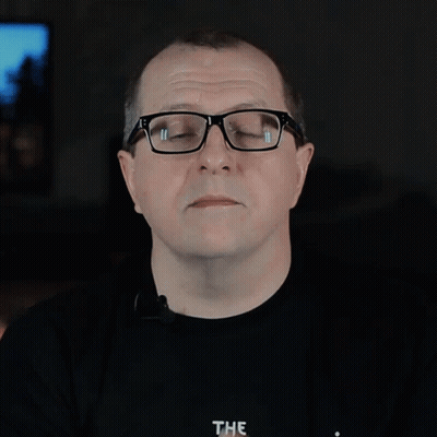 A Man Wearing Glasses And A Black Shirt Says Motion Sickness The GIF