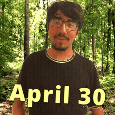 A Man Wearing Glasses And A Black Shirt That Says April 30 On It GIF