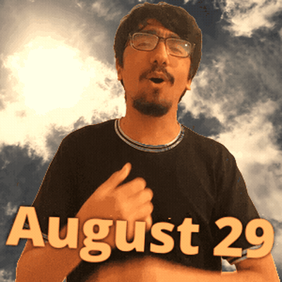 A Man Wearing Glasses And A Black Shirt That Says August 29 On It GIF