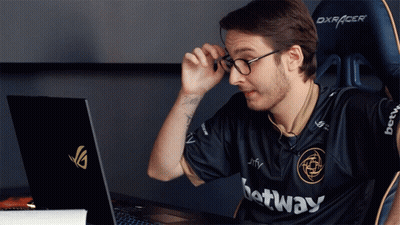 A Man Wearing Glasses And A Black Shirt That Says ' Betway ' On It GIF
