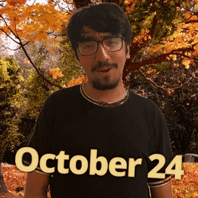 A Man Wearing Glasses And A Black Shirt That Says October 24 On It GIF