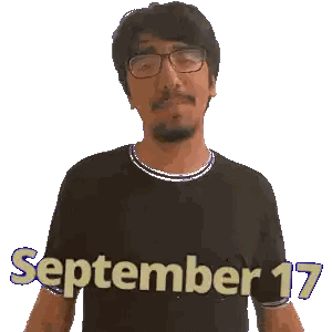 A Man Wearing Glasses And A Black Shirt That Says September 17 On It Sticker