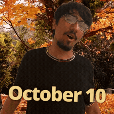 A Man Wearing Glasses And A Black Shirt With The Date October 10 GIF