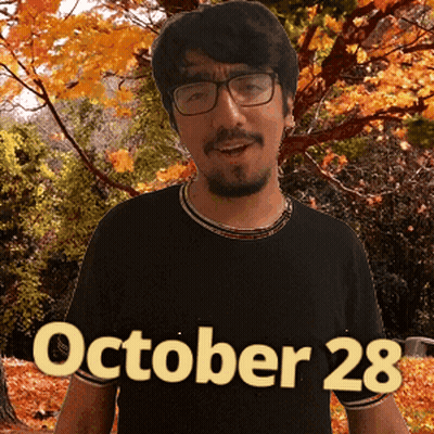 A Man Wearing Glasses And A Black Shirt With The Date October 28 On The Bottom GIF