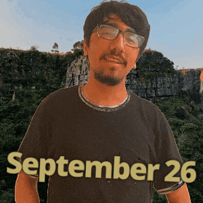 A Man Wearing Glasses And A Black Shirt With The Date September 26 On It GIF