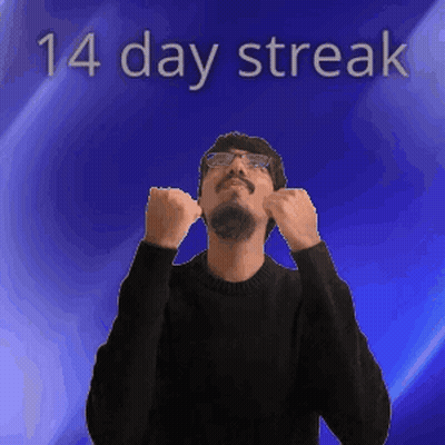 A Man Wearing Glasses And A Black Sweater Stands In Front Of A Blue Background With The Words 14 Day Streak Above Him GIF