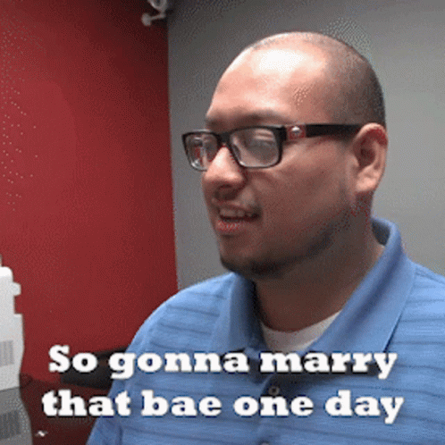 A Man Wearing Glasses And A Blue Shirt Is Saying So Gonna Marry That Bae One Day GIF