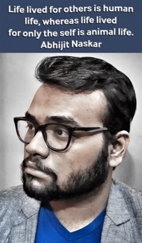 A Man Wearing Glasses And A Blue Shirt With A Quote About Life Lived For Others Is Human Life GIF
