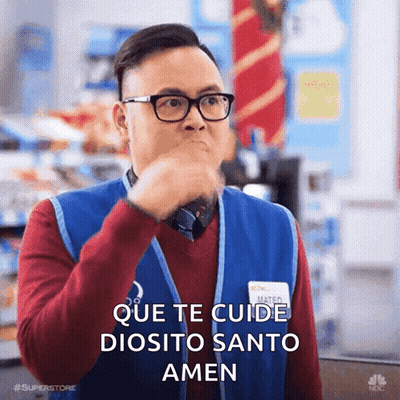 A Man Wearing Glasses And A Blue Vest Says Que Te Cuide Diosito Santo Amen In Spanish GIF