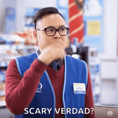 A Man Wearing Glasses And A Blue Vest Says Scary Verdad GIF
