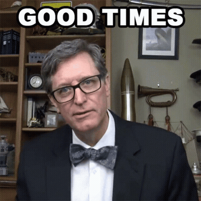 A Man Wearing Glasses And A Bow Tie Has The Words Good Times Above Him GIF