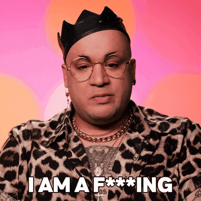 A Man Wearing Glasses And A Crown Says I Am A F * * * Ing GIF