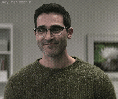 A Man Wearing Glasses And A Green Sweater Has The Name Daily Tyler Hoechlin Written Above Him GIF