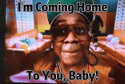 A Man Wearing Glasses And A Hat Says " I 'M Coming Home To You Baby " GIF