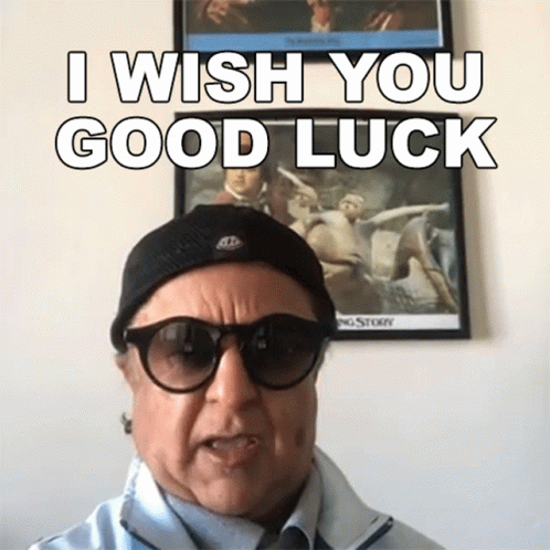 A Man Wearing Glasses And A Hat Says I Wish You Good Luck GIF