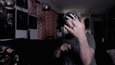 A Man Wearing Glasses And A Headband With The Word Whip Written On It GIF