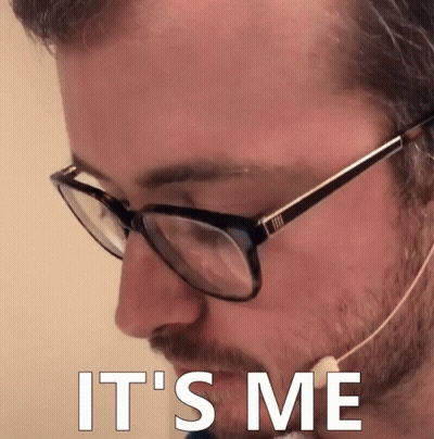 A Man Wearing Glasses And A Headset With The Words It 'S Me On His Face GIF