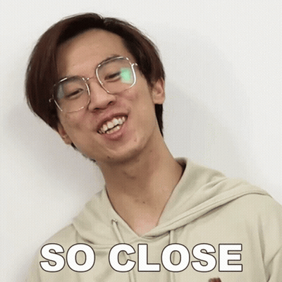 A Man Wearing Glasses And A Hoodie Has The Word So Close On His Shirt GIF
