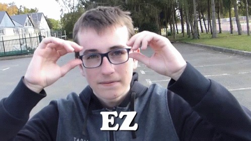 A Man Wearing Glasses And A Hoodie With The Word Ez On The Bottom GIF