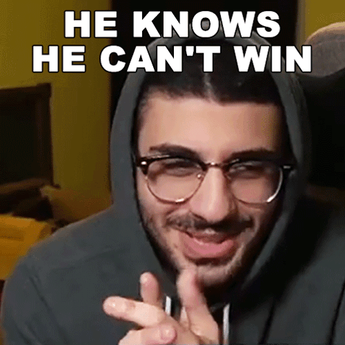 A Man Wearing Glasses And A Hoodie With The Words He Knows He Can 'T Win Above Him GIF