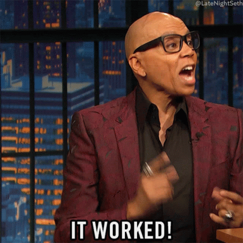 A Man Wearing Glasses And A Maroon Jacket Says It Worked GIF