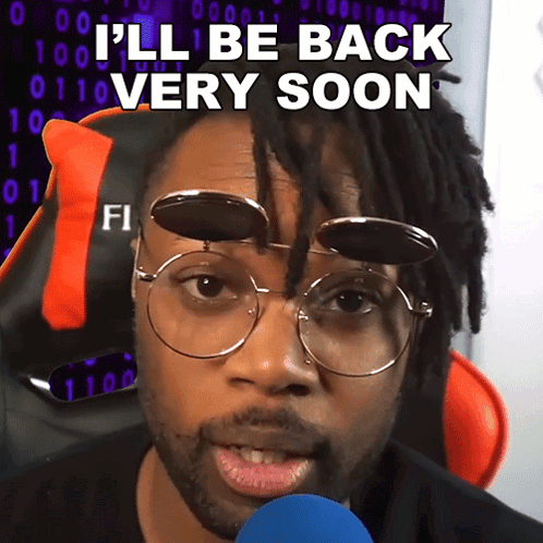 A Man Wearing Glasses And A Microphone Says I 'Ll Be Back Very Soon GIF