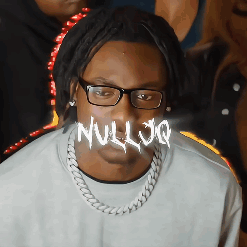 A Man Wearing Glasses And A Necklace Has The Word Nulljo Written On His Face GIF