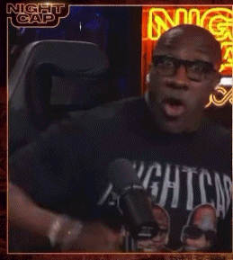 A Man Wearing Glasses And A Nightcap Shirt GIF