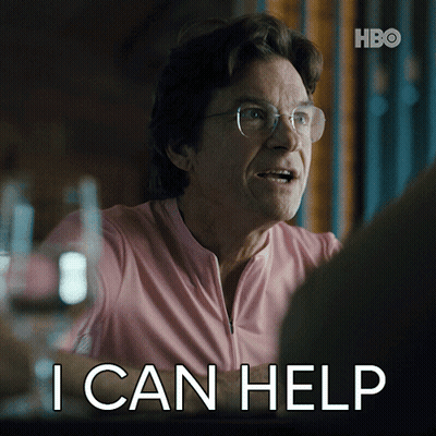 A Man Wearing Glasses And A Pink Shirt Says " I Can Help " GIF