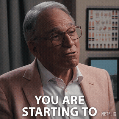 A Man Wearing Glasses And A Pink Suit Says You Are Starting To Netflix GIF