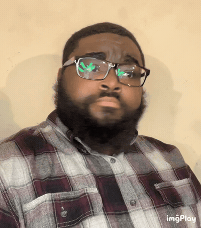 A Man Wearing Glasses And A Plaid Shirt Has The Word Imgplay At The Bottom Of His Image GIF